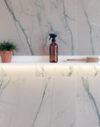6-inch-deep Mini Mod floating aluminum shelf in white finish, shown as a compact modular display shelf.