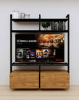 Modular media shelving extension with black shelves and black vertical post, with Tea for Two wood cabinet storage, shown with open shelf levels.