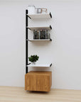 Modular media shelving extension with white shelves and black vertical post, with Tea for Two wood cabinet storage, one bay, 24-inch shelf width, shown with open shelf levels.