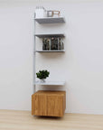 Modular media shelving extension with satin shelves and satin vertical post, with Tea for Two wood cabinet storage, one bay, 24-inch shelf width, shown with open shelf levels.