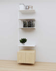 Modular media shelving extension with white shelves and white vertical post, with Casting Light wood cabinet storage, one bay, 24-inch shelf width, shown with open shelf levels.