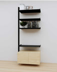 Modular media shelving extension with black shelves and black vertical post, with Casting Light wood cabinet storage, one bay, 31-inch shelf width, shown with open shelf levels.