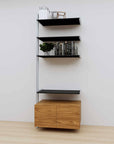 Modular media shelving extension with black shelves and satin vertical post, with Tea for Two wood cabinet storage, one bay, 31-inch shelf width, shown with open shelf levels.