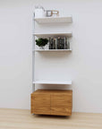Modular media shelving extension with white shelves and satin vertical post, with Tea for Two wood cabinet storage, one bay, 31-inch shelf width, shown with open shelf levels.