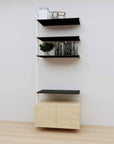 Modular media shelving extension with black shelves and white vertical post, with Casting Light wood cabinet storage, one bay, 31-inch shelf width, shown with open shelf levels.