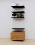 Modular media shelving extension with black shelves and white vertical post, with Tea for Two wood cabinet storage, one bay, 31-inch shelf width, shown with open shelf levels.
