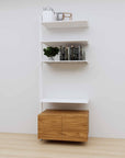 Modular media shelving extension with white shelves and white vertical post, with Tea for Two wood cabinet storage, one bay, 31-inch shelf width, shown with open shelf levels.
