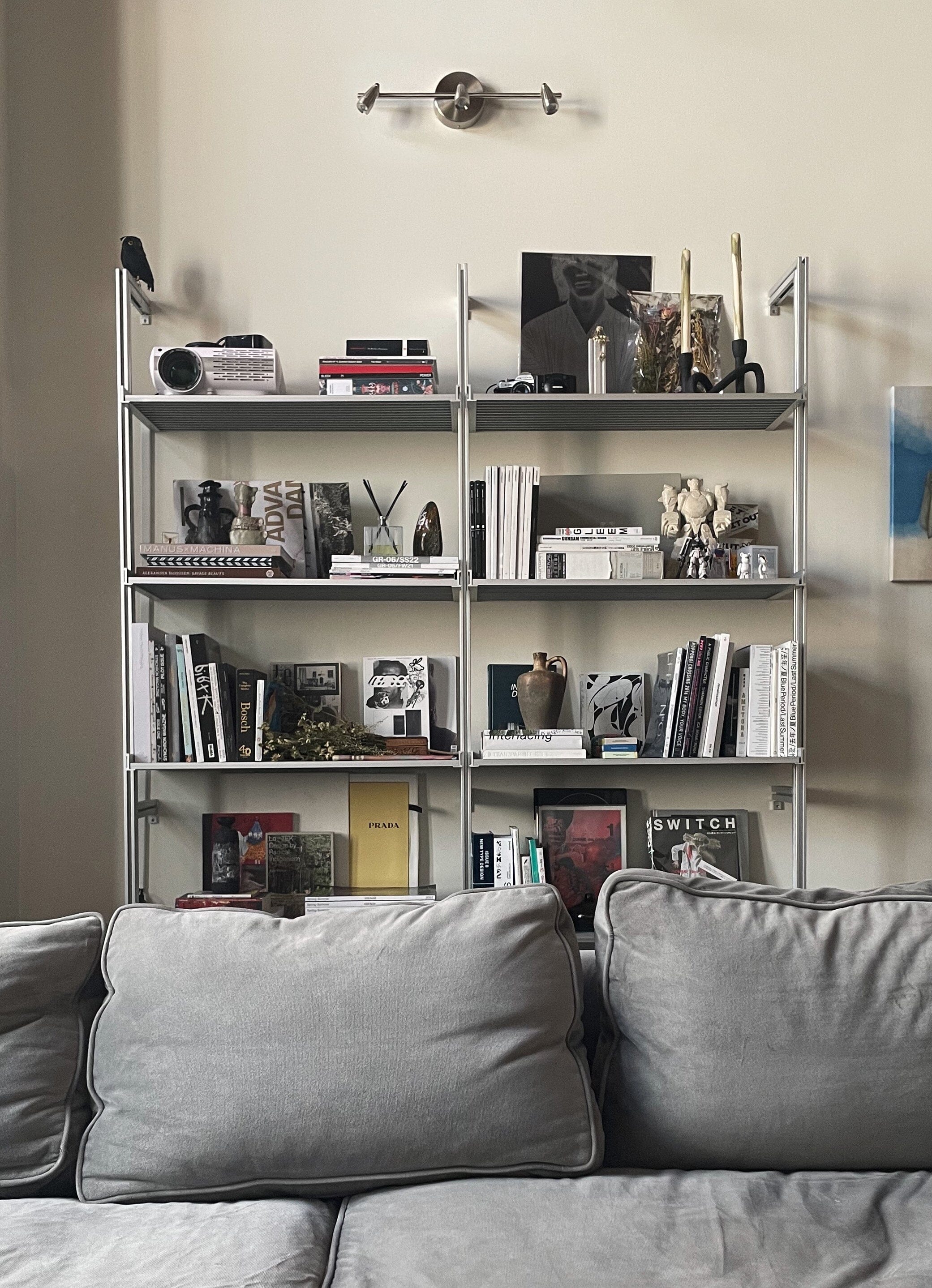 Designers Use Shelves to House Their Art Book and Boot Collections