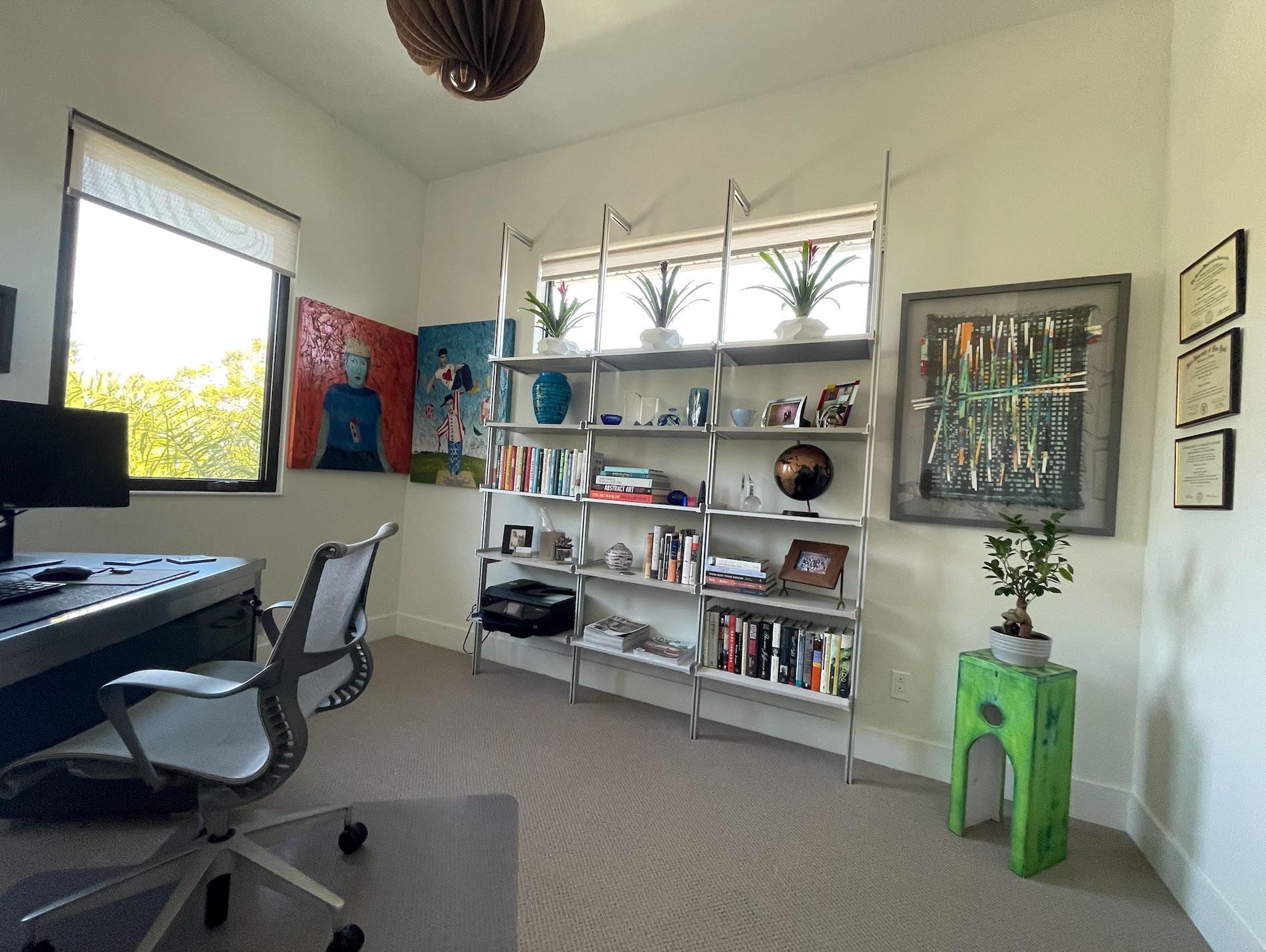 Florida Business Consultant Uses Custom Shelves In His Home Office
