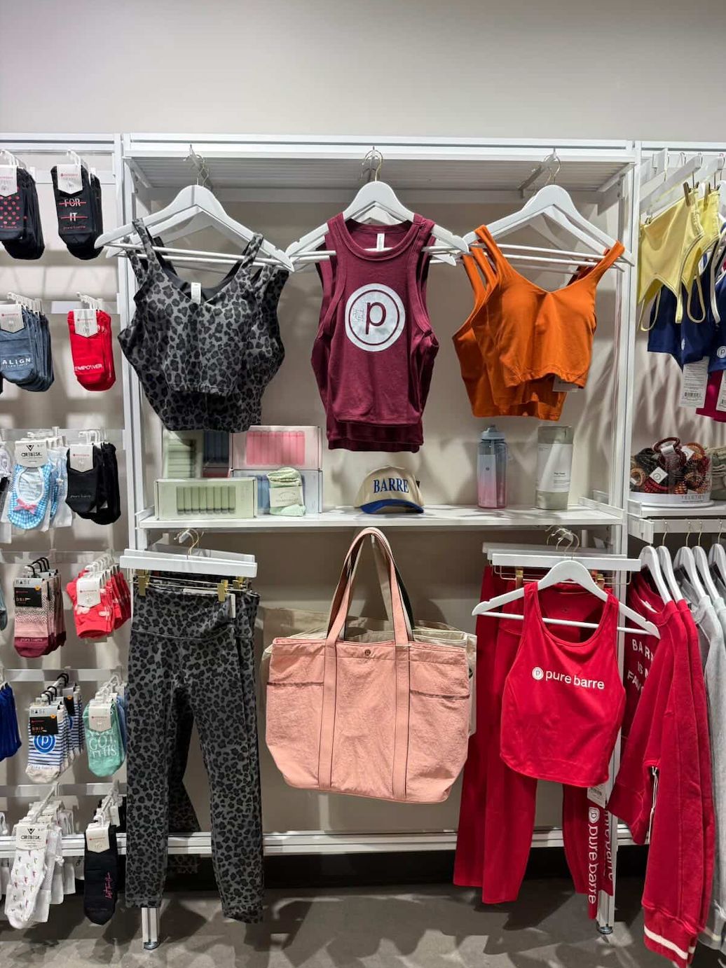 Pure Barre Installs Custom Shelves to Display Merchandise
